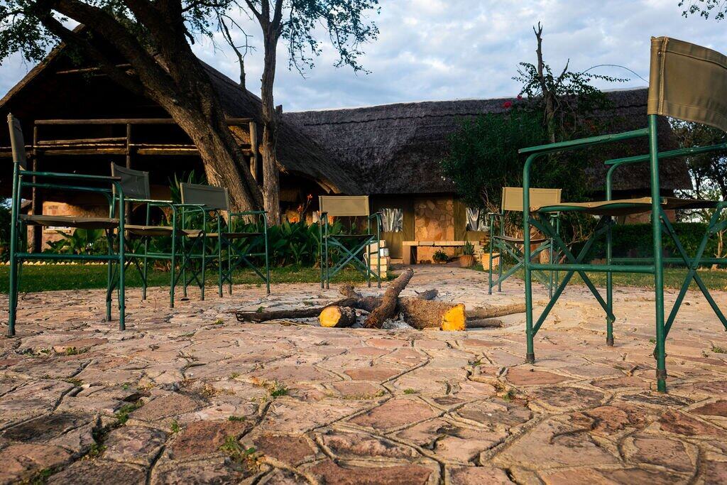 Lodge fire pit lounge photography Zimbabwe